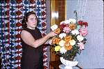 EllenArrangingFlowers2March69.jpg